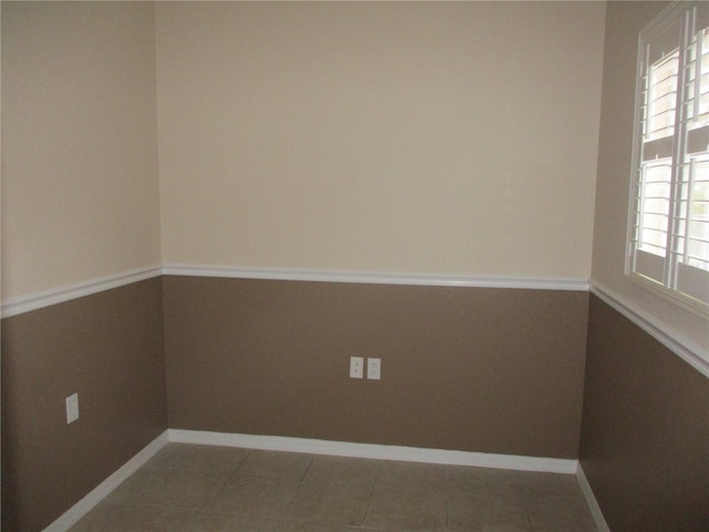 spare room with tile patterned flooring