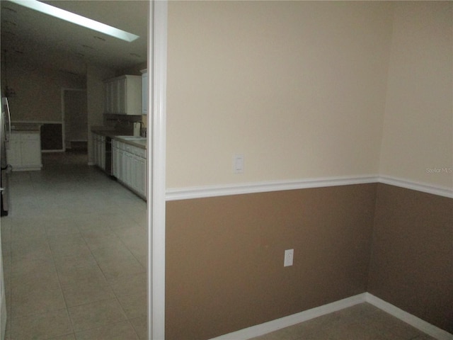 empty room with vaulted ceiling