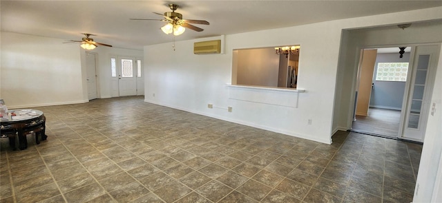17808 SE 115th Ct, Summerfield, FL 34491 - unfurnished living room with a wall mounted air conditioner, a ceiling fan, baseboards, and a chandelier