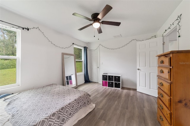 bedroom featuring ceiling fan and wood-type flooring