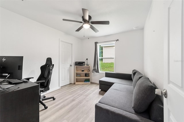 office featuring ceiling fan and light wood-type flooring