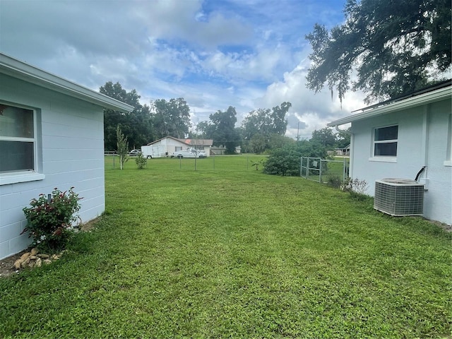 view of yard featuring central AC unit