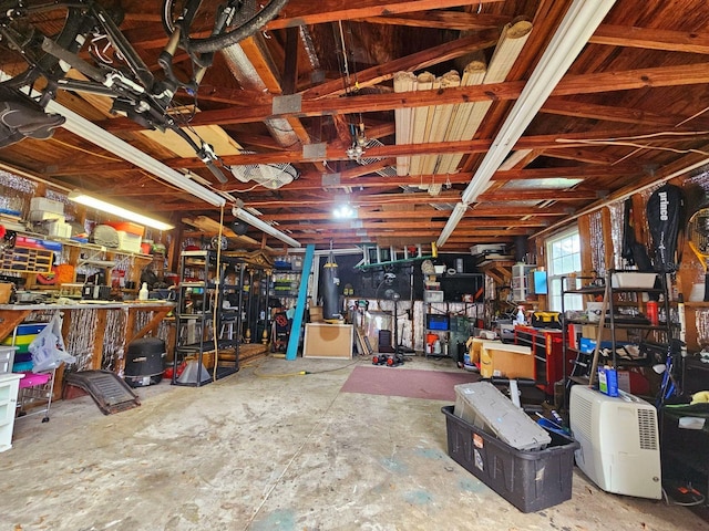 garage with a workshop area