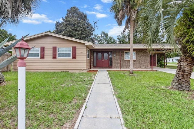 single story home with a front lawn