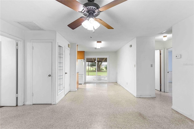 unfurnished room with ceiling fan