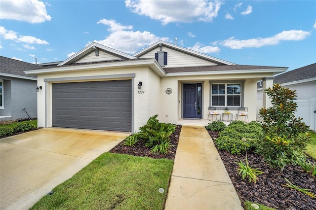 view of front of home with a garage