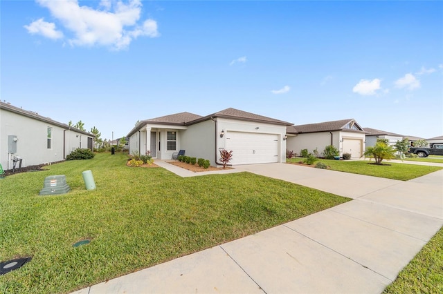 view of front of home with a garage and a front lawn