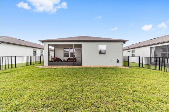 back of house with an outdoor hangout area, a lawn, and a patio