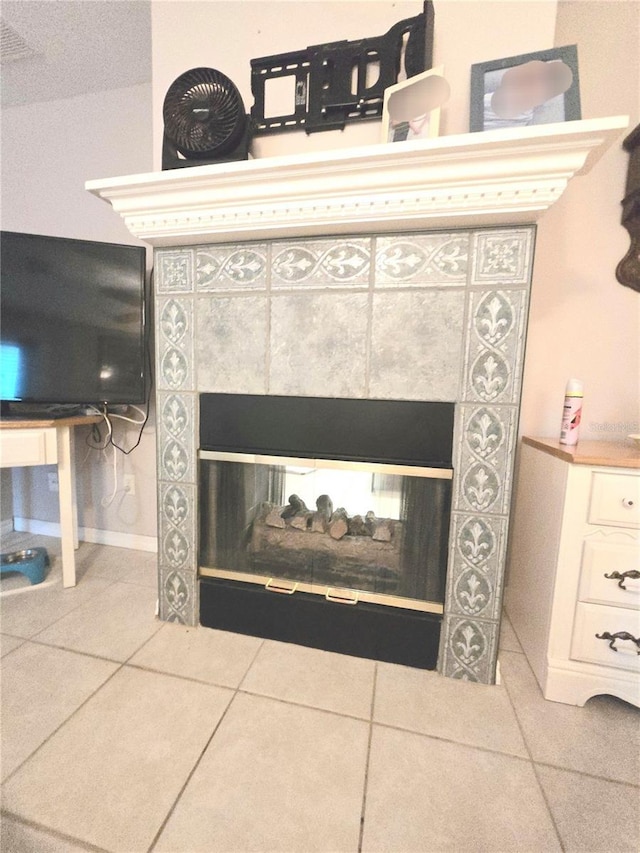 details with a tile fireplace