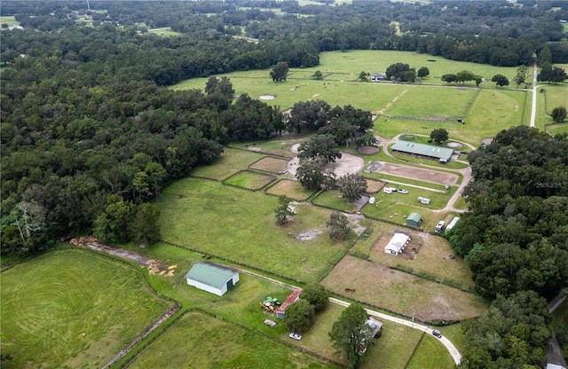 birds eye view of property featuring a rural view