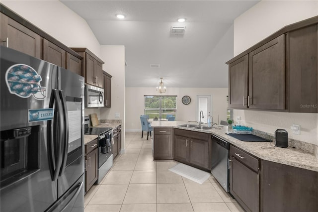 kitchen featuring sink, kitchen peninsula, an inviting chandelier, appliances with stainless steel finishes, and dark brown cabinetry