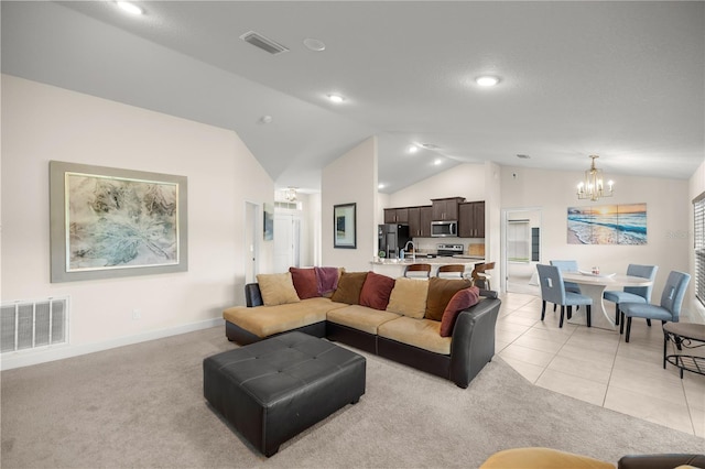 tiled living room with sink, lofted ceiling, a chandelier, and a textured ceiling