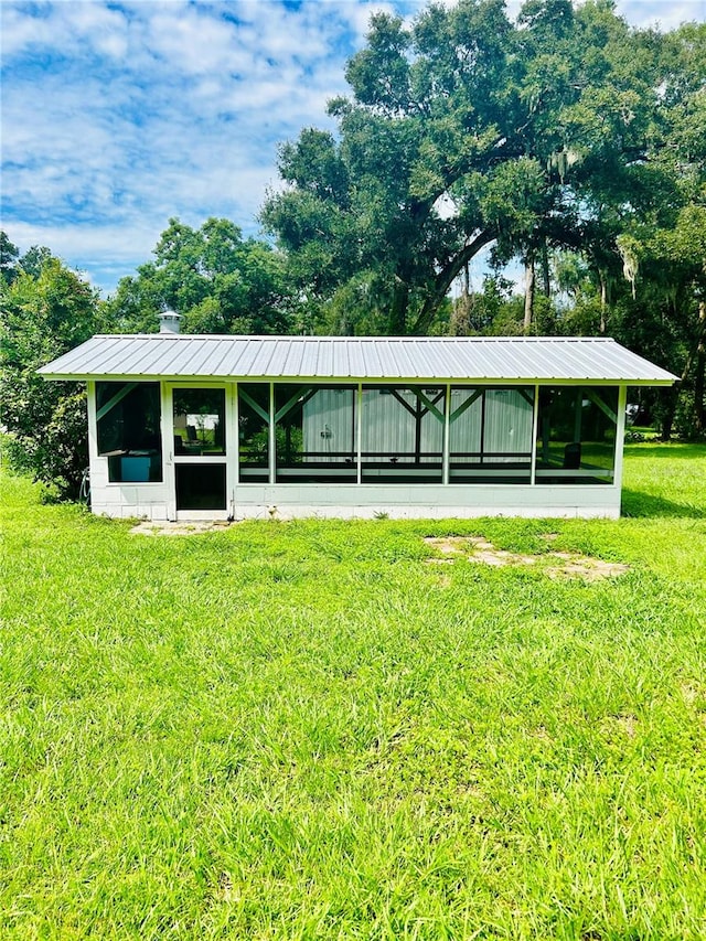 exterior space featuring a yard