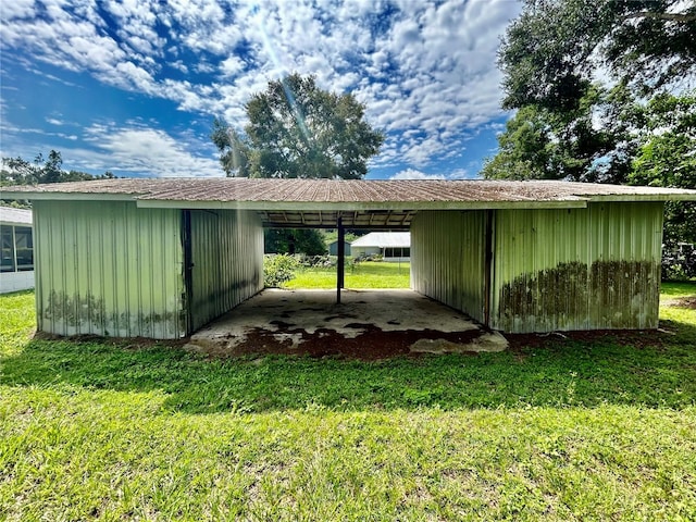 view of outdoor structure with a yard