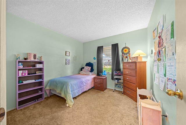 carpeted bedroom with a textured ceiling