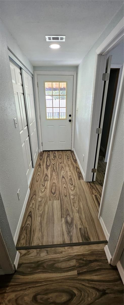 hall featuring hardwood / wood-style flooring