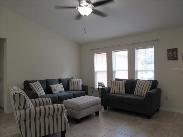 living room with ceiling fan and light tile patterned floors