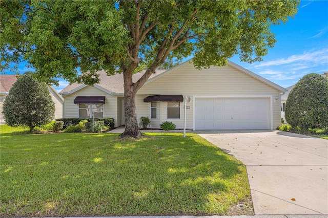 ranch-style home featuring a front yard and a garage