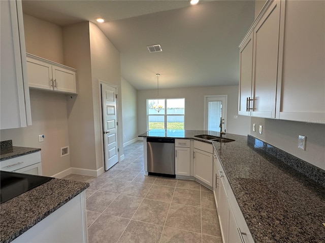 kitchen featuring dark stone counters, sink, white cabinets, hanging light fixtures, and stainless steel dishwasher