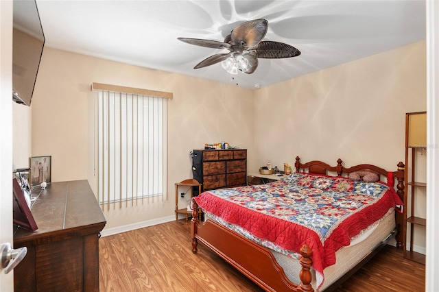 bedroom with ceiling fan and light wood-type flooring