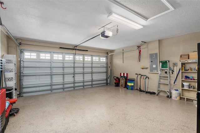 garage featuring a garage door opener and electric panel