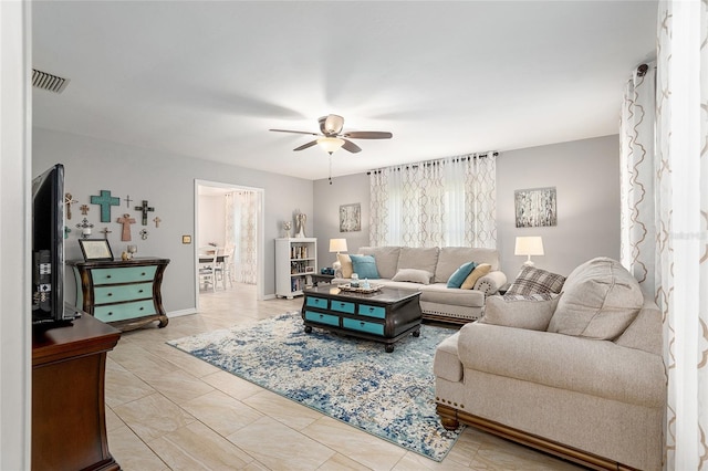 living room featuring ceiling fan