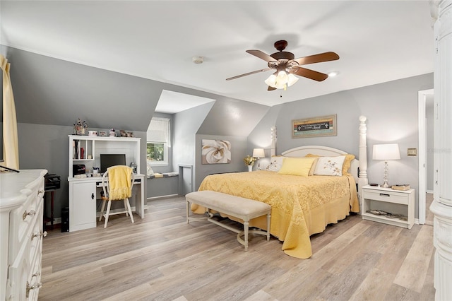 bedroom with light wood-type flooring, lofted ceiling, and ceiling fan