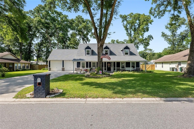 cape cod-style house with a front lawn and a garage