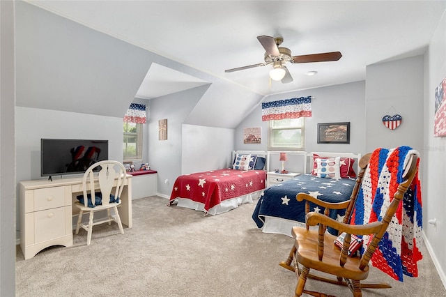 carpeted bedroom with ceiling fan and lofted ceiling