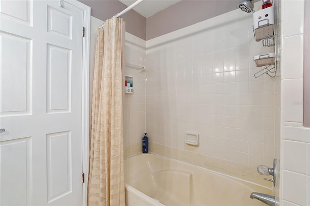 bathroom with shower / tub combo with curtain