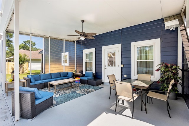 sunroom / solarium with ceiling fan