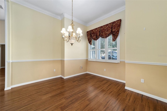 unfurnished room featuring an inviting chandelier, crown molding, and dark wood-type flooring