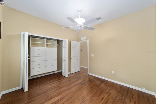 unfurnished bedroom with a closet, ceiling fan, and dark hardwood / wood-style floors