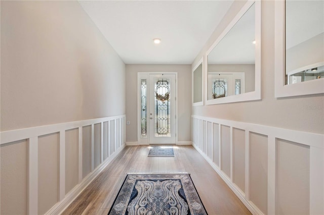 doorway to outside with light hardwood / wood-style flooring