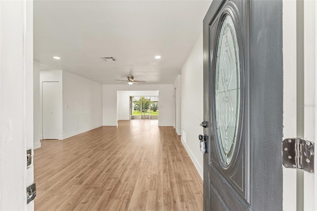 entryway featuring light hardwood / wood-style floors and ceiling fan