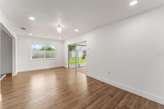 spare room featuring hardwood / wood-style floors