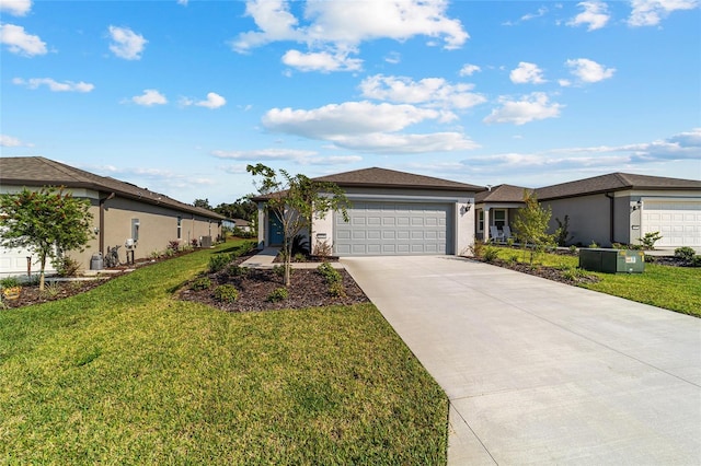 ranch-style home with a front lawn and a garage