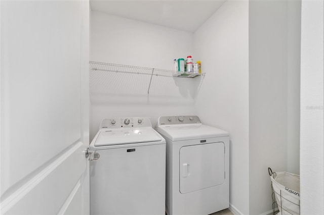 laundry area featuring separate washer and dryer