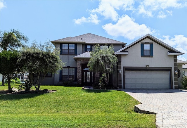 view of front of home featuring a front lawn and a garage