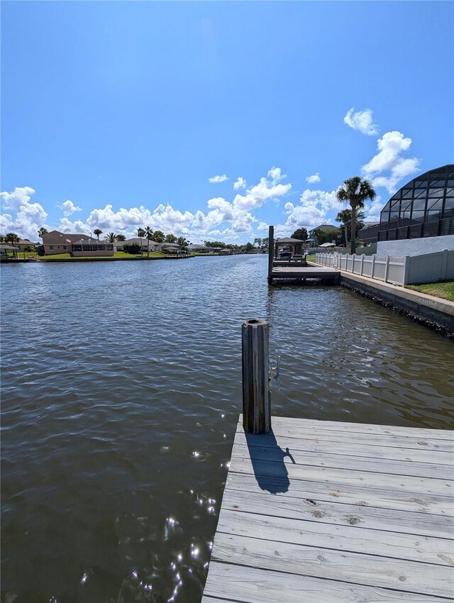 view of dock with a water view