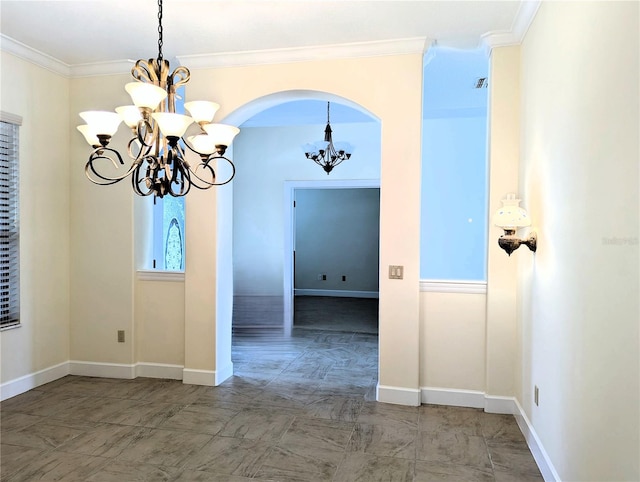 unfurnished dining area with a notable chandelier and crown molding