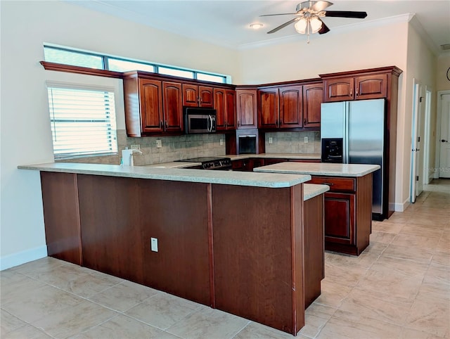 kitchen featuring ornamental molding, stainless steel appliances, kitchen peninsula, and tasteful backsplash