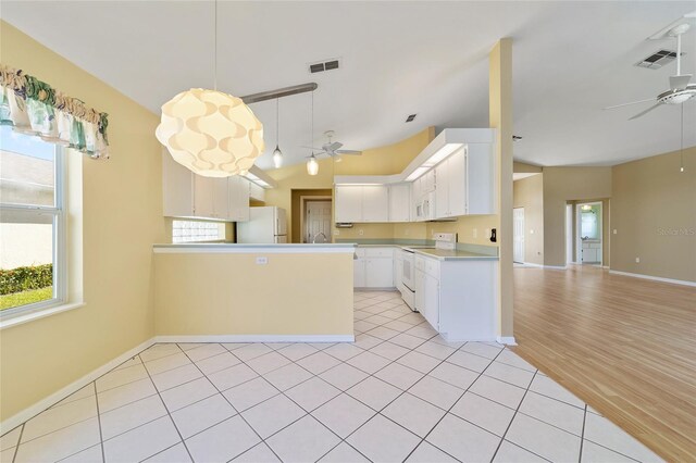 kitchen with white cabinets, white appliances, kitchen peninsula, light hardwood / wood-style flooring, and ceiling fan