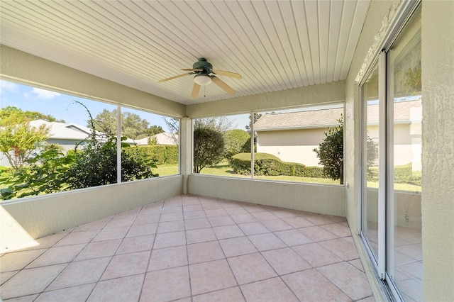 exterior space featuring a healthy amount of sunlight and ceiling fan