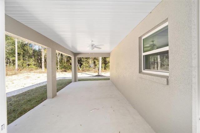 view of patio / terrace featuring ceiling fan