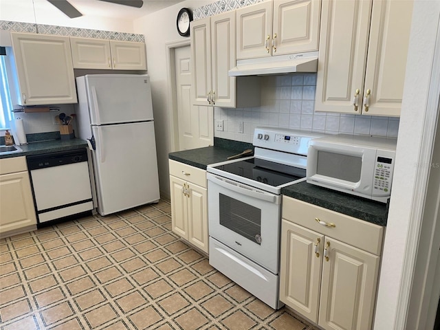 kitchen with white appliances, ceiling fan, and tasteful backsplash