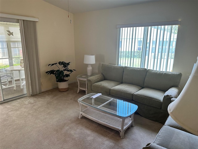 living room featuring light colored carpet