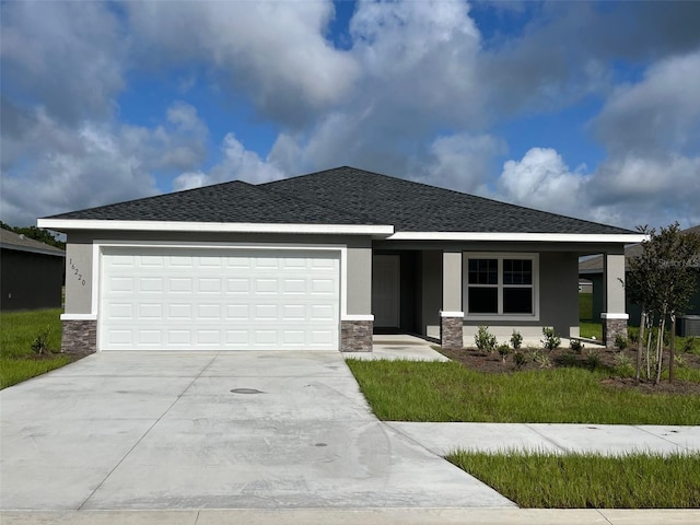 view of front of house with a garage