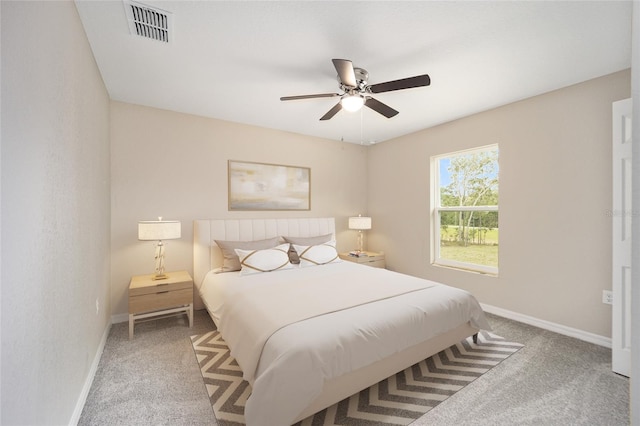 carpeted bedroom featuring ceiling fan