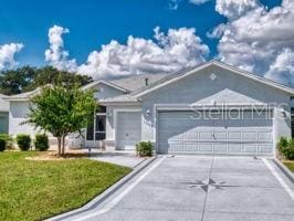 single story home with a front lawn and a garage